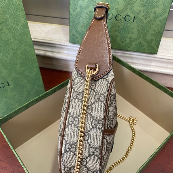 Oval leather half-moon mini handbag - Image 4
