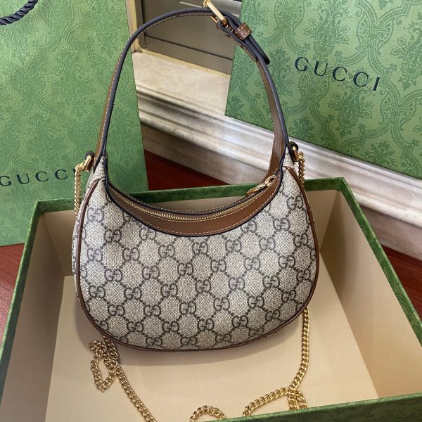 Oval leather half-moon mini handbag - Image 3
