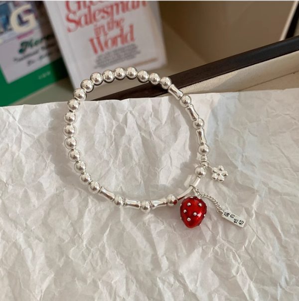 Berry has a problem - a strawberry bracelet. - Image 2