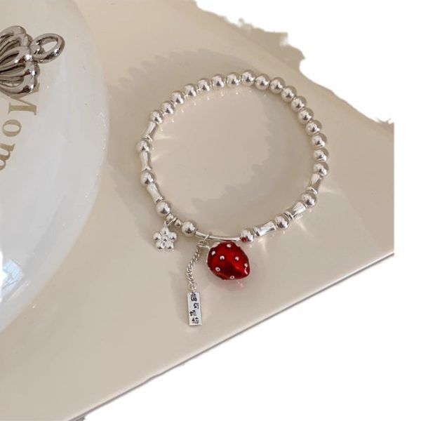Berry has a problem - a strawberry bracelet. - Image 3