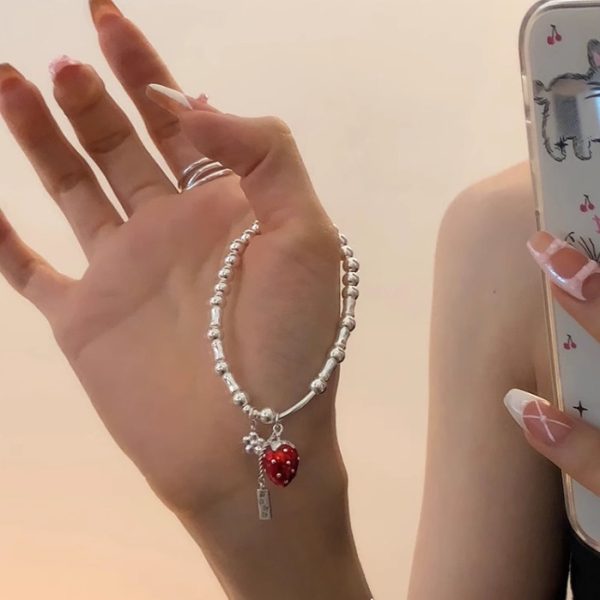 Berry has a problem - a strawberry bracelet. - Image 4