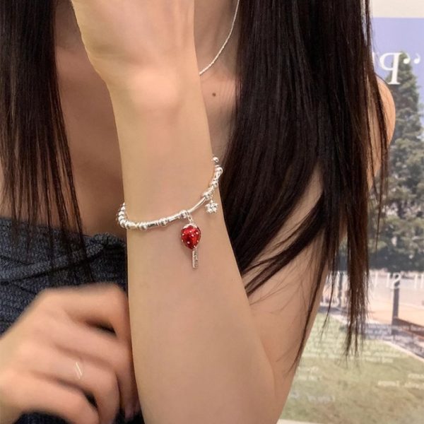 Berry has a problem - a strawberry bracelet. - Image 5