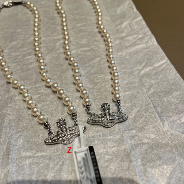 Saturn Pearl Necklace