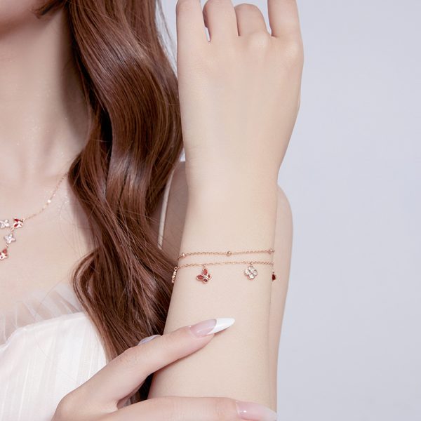 Four-leaf clover butterfly bracelet