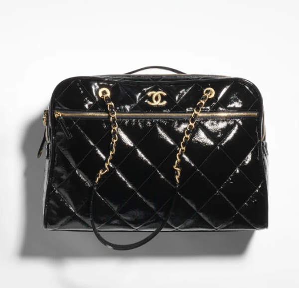 CHANEL Travel bag  Fur grain small cowhide with metallic gold Black